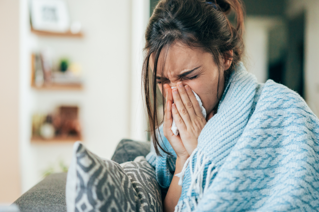 woman wrapped up in a blanket struggling with cymbalta withdrawal symptoms